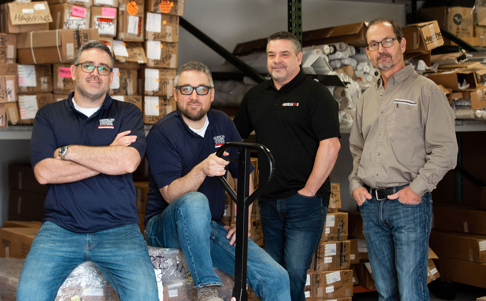 American Track Supply team in the warehouse